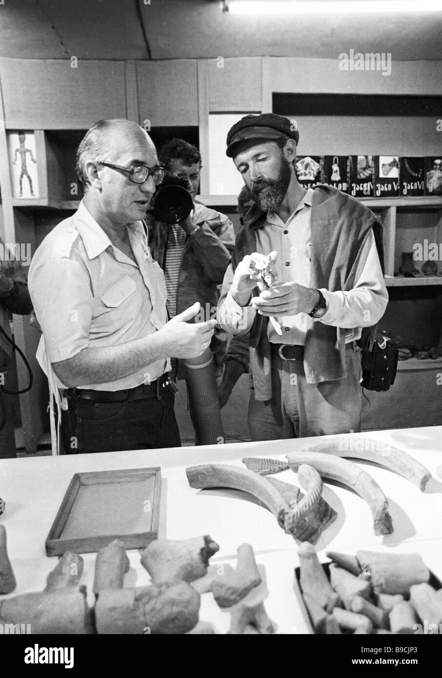 British explorer Tim Severin right examining the site of archeological ...
