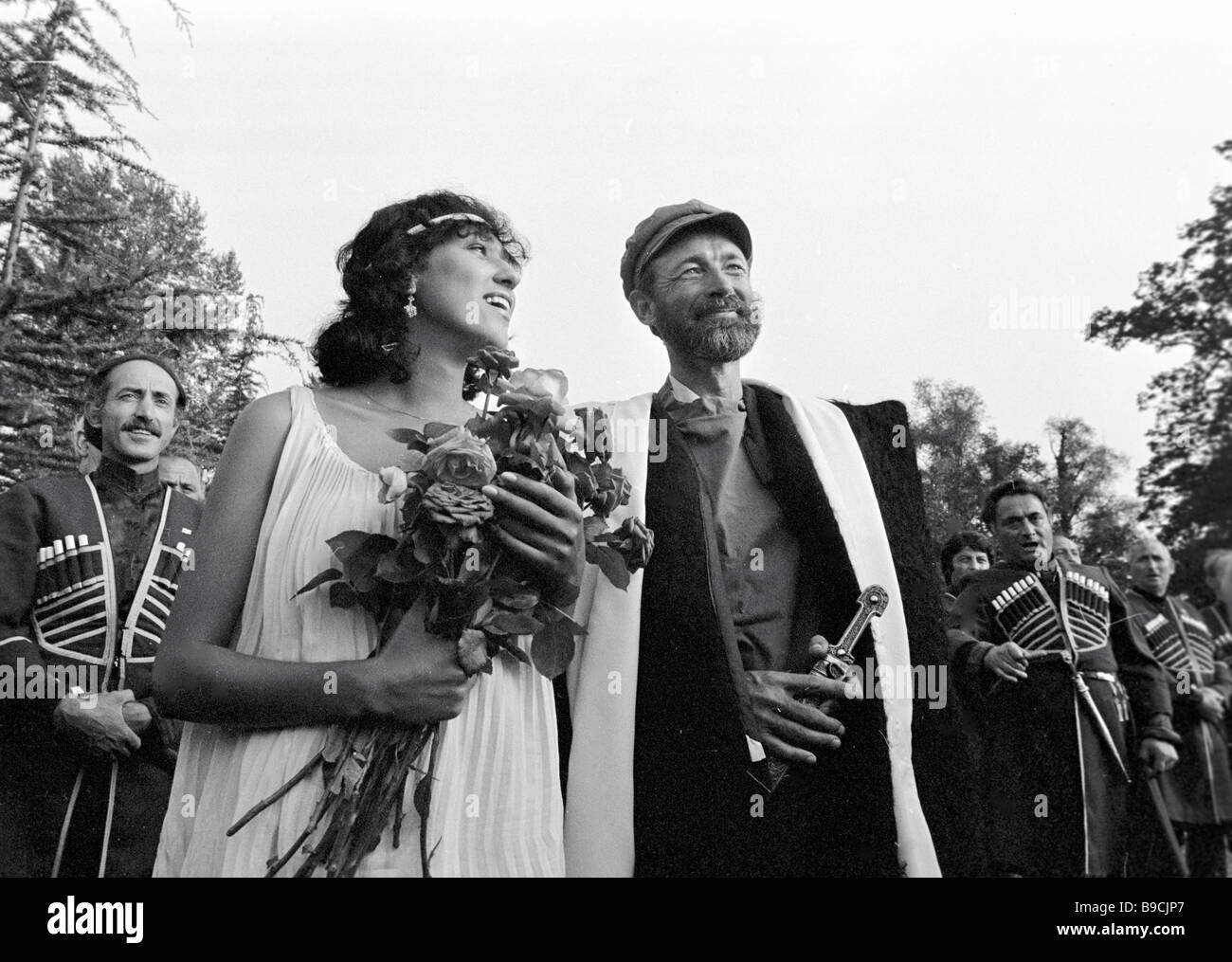 British explorer Tim Severin right among local dwellers dressed in ...