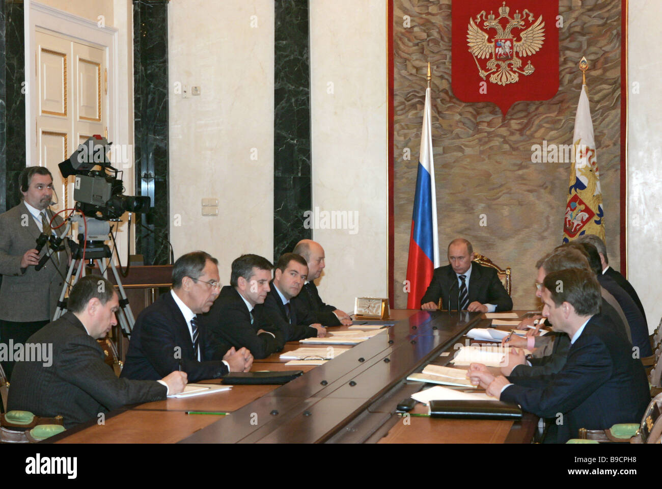 President Vladimir Putin Center Conferring With The Cabinet