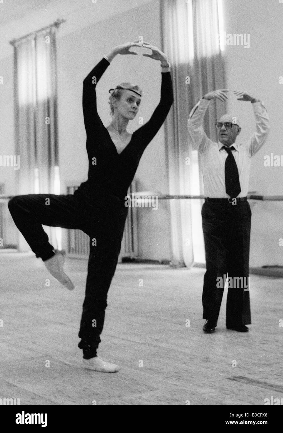 Ballerina Anneli Alhanko left of the Swedish Royal Opera Theater rehearsing  with Soviet ballet master Asaf Messerer right Stock Photo - Alamy