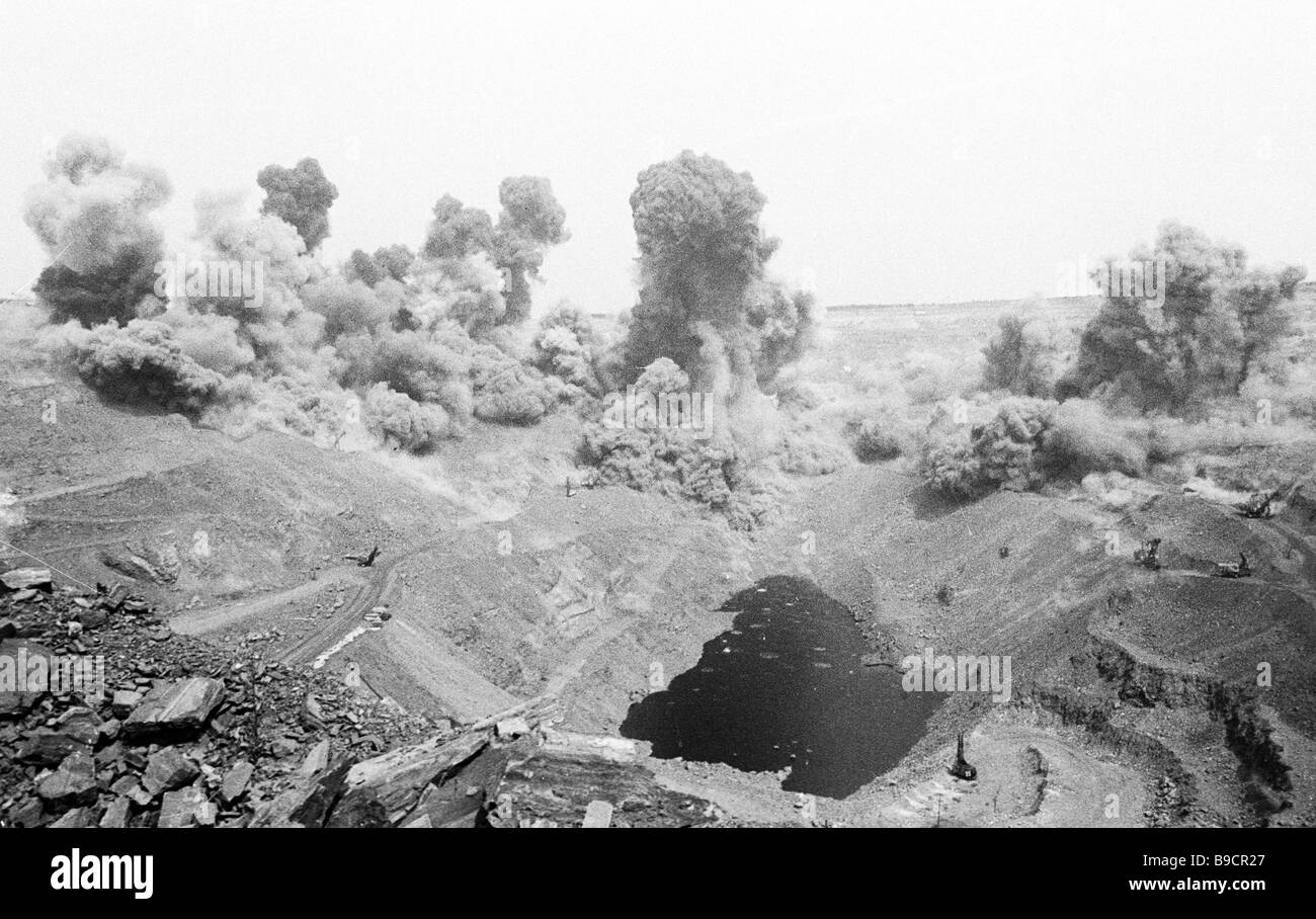 A blast in an open pit mine Krivorozhsky coal field Stock Photo - Alamy