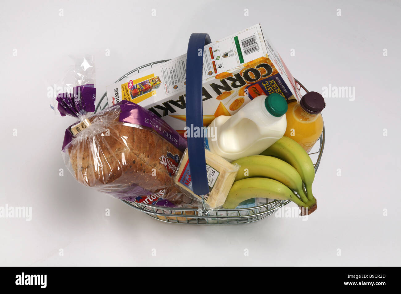 A shopping basket filled with groceries Stock Photo Alamy