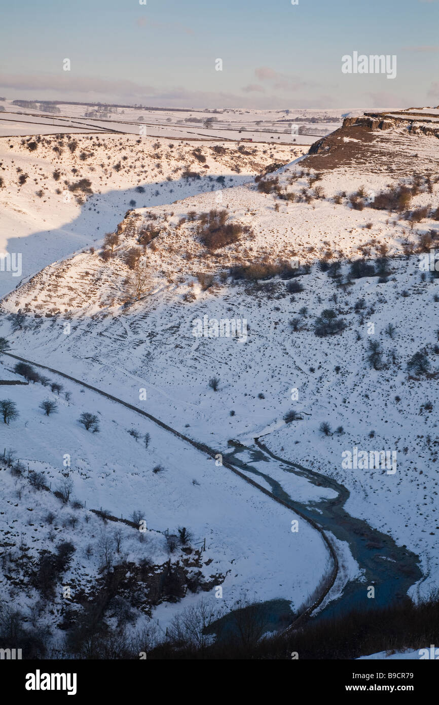 Early morning in Cressbrook Dale after a fall of snow, Peak District, Derbyshire Stock Photo