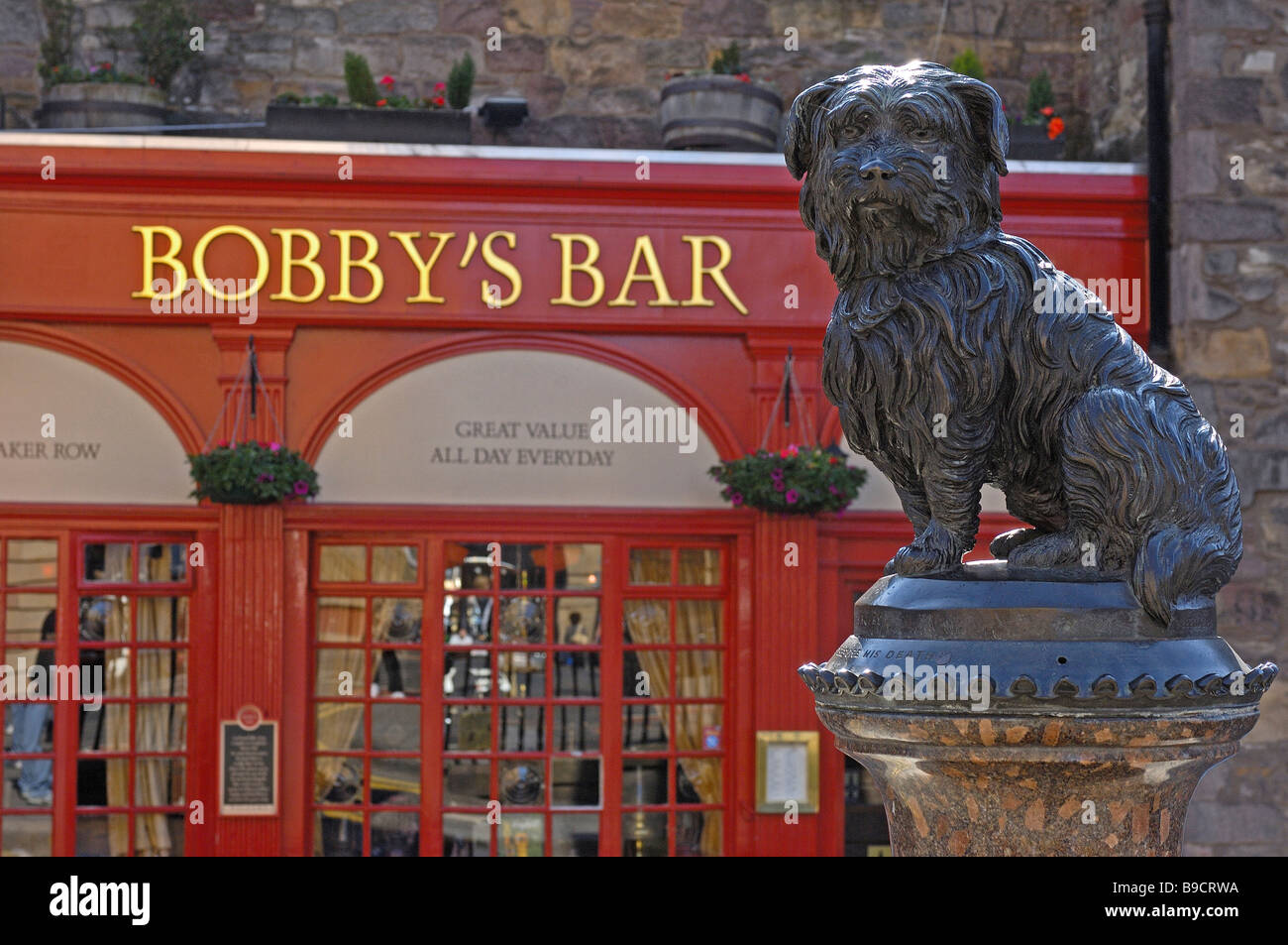 Greyfriars Bobby statue and Bobby s bar at background Edinburgh Lothian