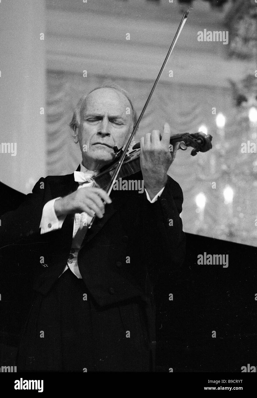 American violinist Yehudi Menuhin on stage of Tchaikovsky concert hall