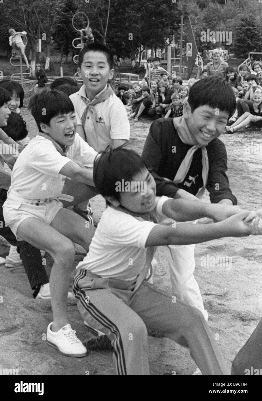 Japanese Kids In A Tug Of War Children S Camp Near Nakhodka Seaport In The Russian Far East Stock Photo Alamy