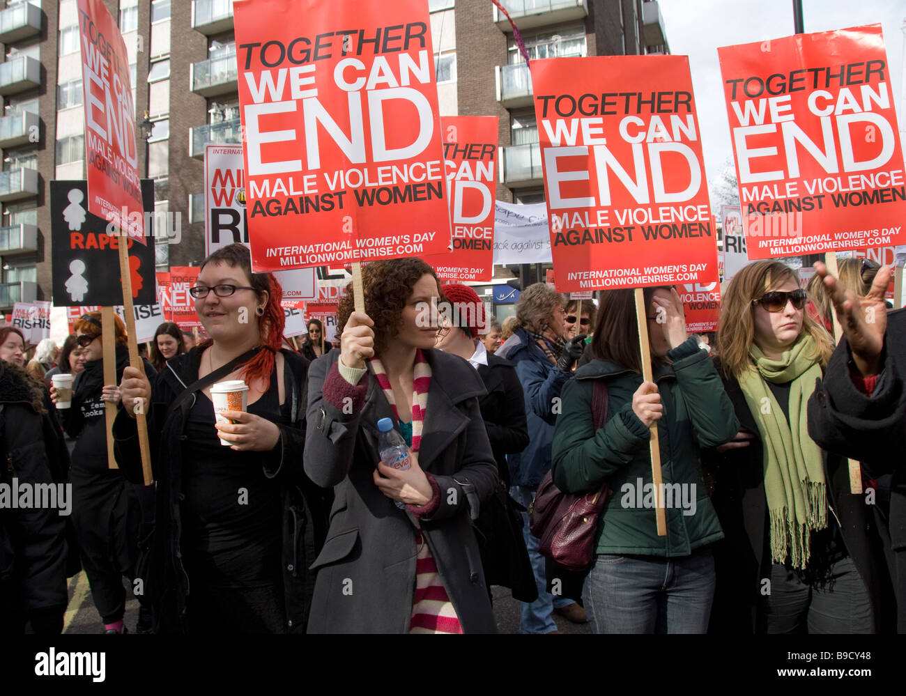 Women's protest through central London against domestic violence Stock Photo