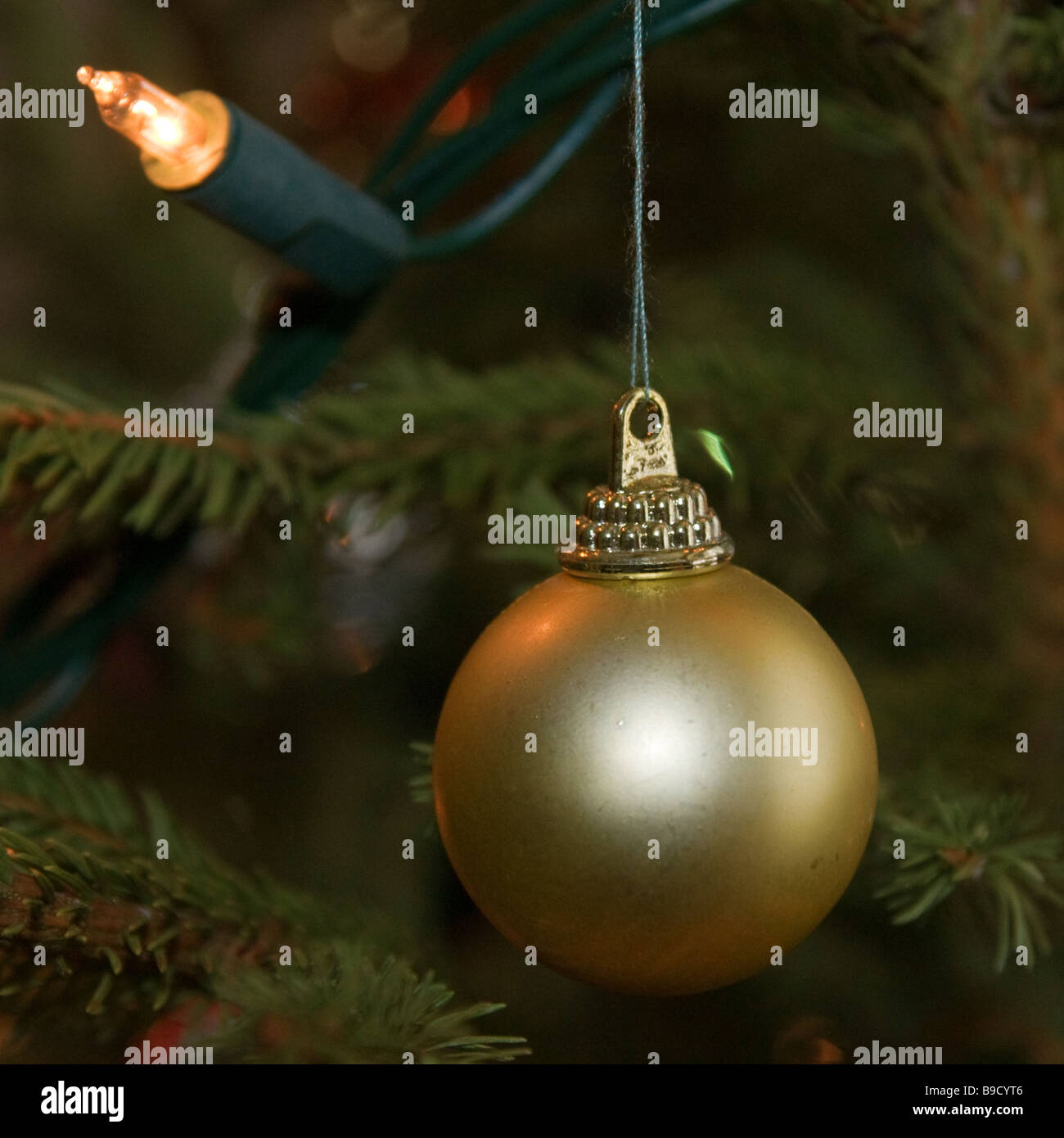 Gold bauble hi-res stock photography and images - Alamy