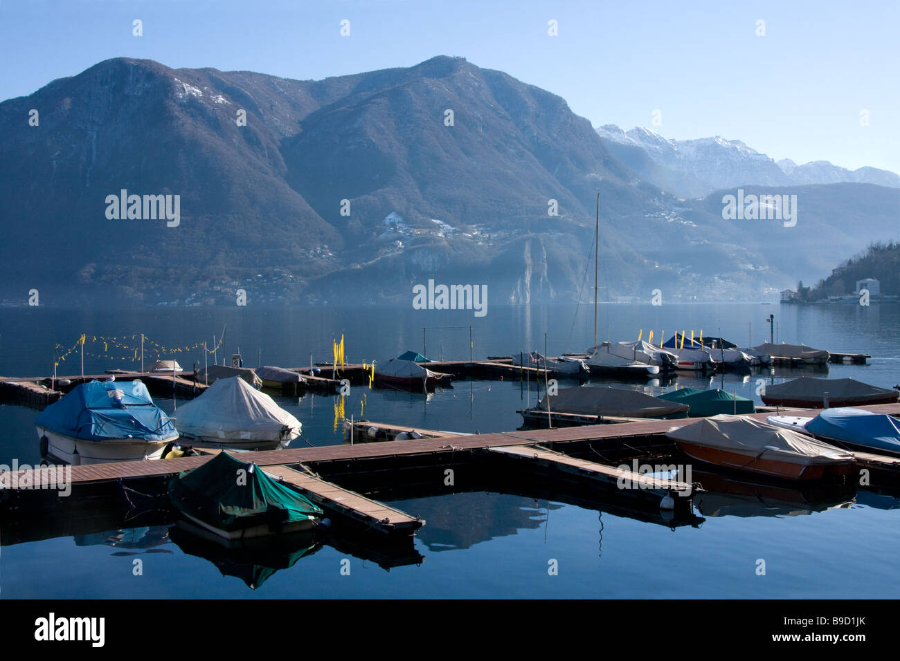 Small boats on Lake Lugano in Switzerland Stock Photo Alamy