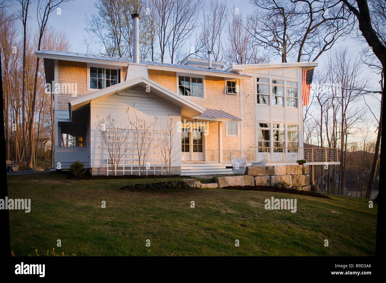 Contemporary multiple story shingle style home Stock Photo