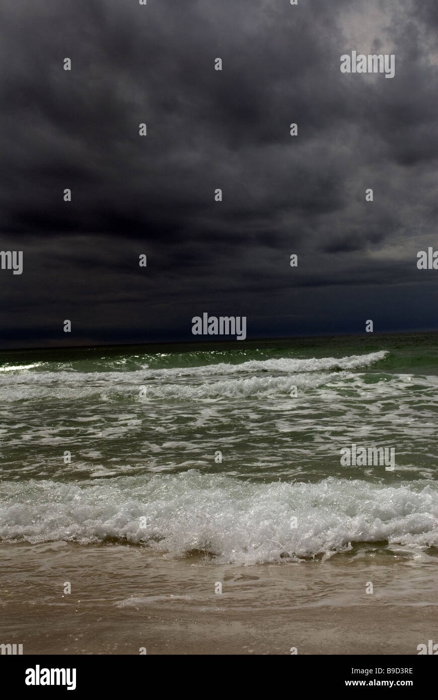 Dark Stormy Skies Over Green Ocean Stock Photo - Alamy