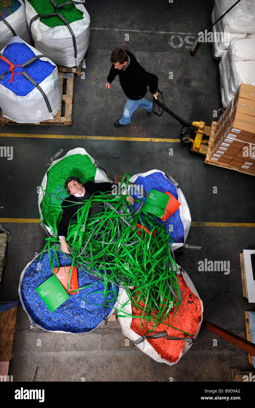 FACTORY FLOOR AT THE COMPANY REMARKABLE WHERE WASTE SHREDDED PLASTIC