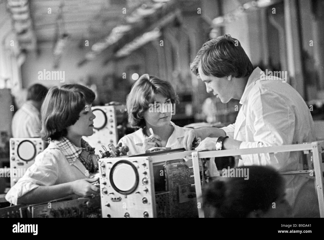 Workers of Elektropribor Factory check flaw detector Stock Photo Alamy