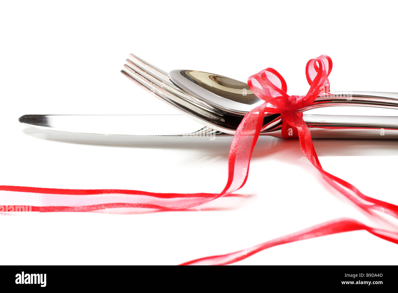 Spoon with ribbon isolated on white hi-res stock photography and images ...
