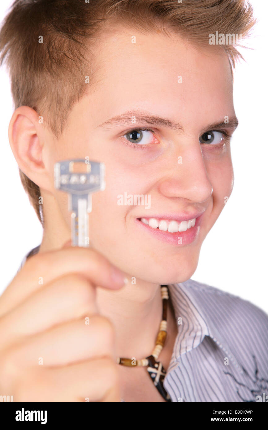 Boy showing key Stock Photo Alamy
