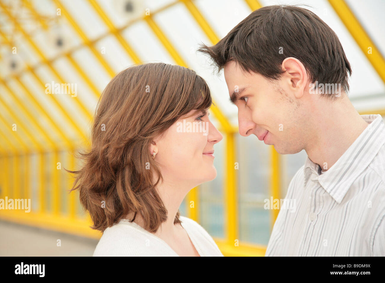 boy and girl look at each other Stock Photo - Alamy