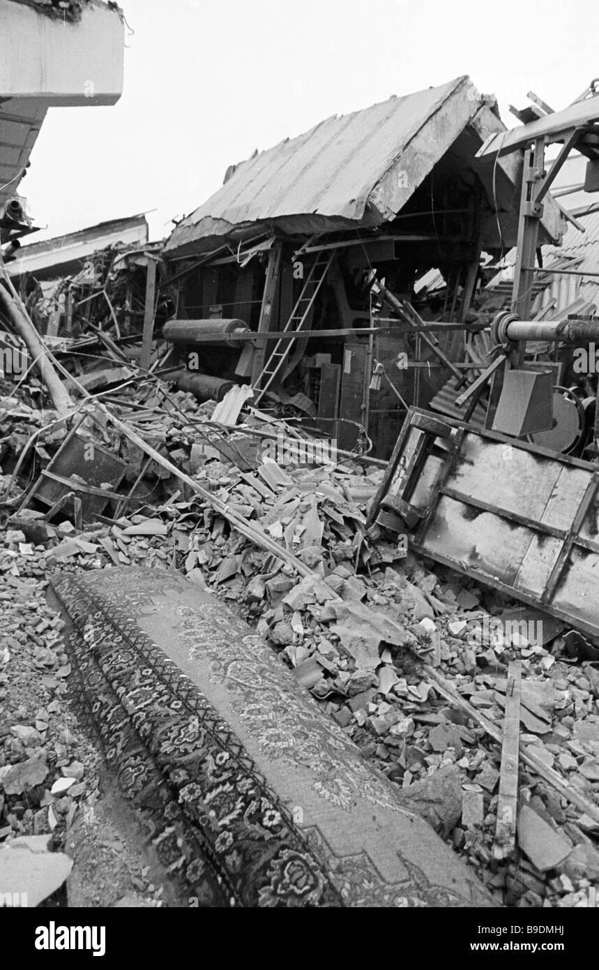 Houses destroyed by an earthquake in Kairakkum Stock Photo Alamy