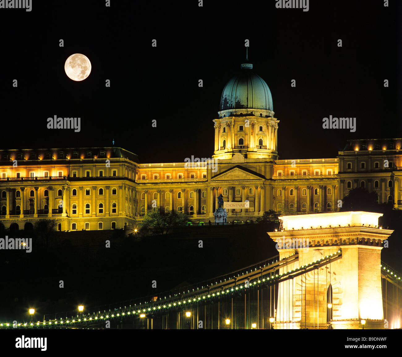 Castle Hill and palace at night, full moon, castle, suspension bridge, Danube, Budapest, Hungary (montage) Stock Photo