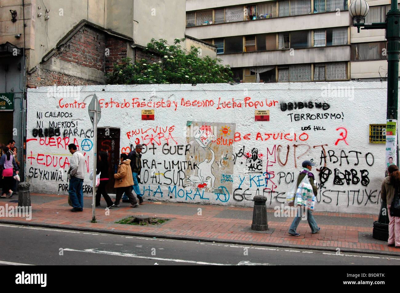 urban art painting graffiti politics protest spray street decay design colour vibrant intense vandalism color Bogota Colombia Stock Photo