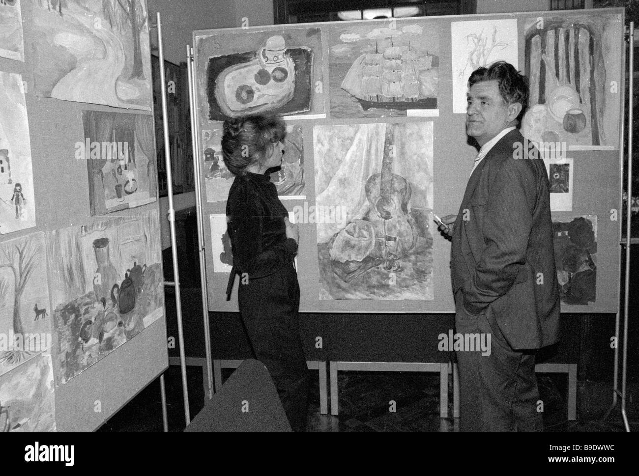 Writer Fazil Iskander right visits an exhibition of children s drawings ...