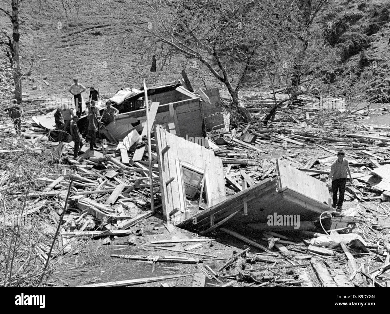 Residents are dismantling houses destroyed by a mudflow Stock Photo Alamy