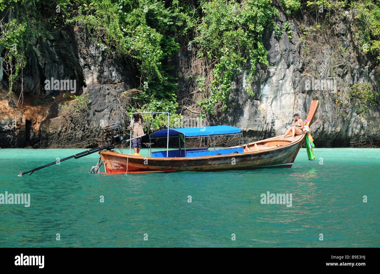 Tourist boats in Viking cave on the island of Phi Phi Ley off the coast of Phuket Thailand Stock Photo