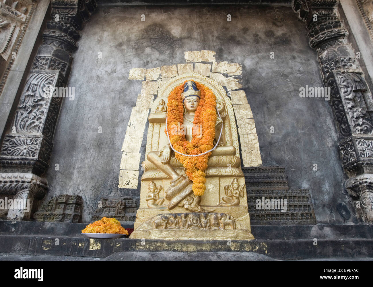 Statue of Buddha in a temple, Mahabodhi Temple, Bodhgaya, Gaya, Bihar, India Stock Photo