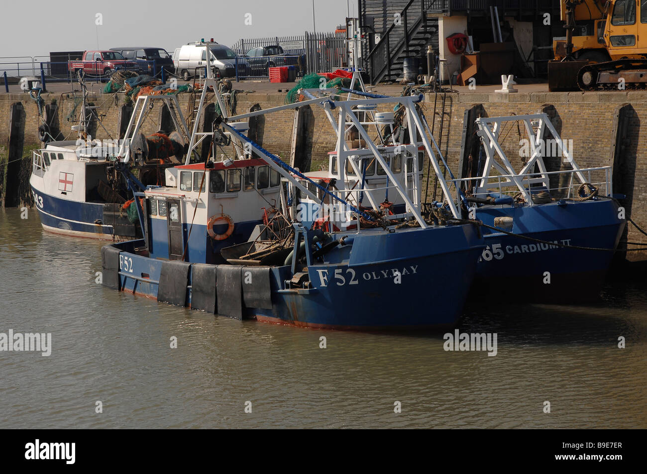 fishing boats in whitstable harbor harbour Stock Photo - Alamy