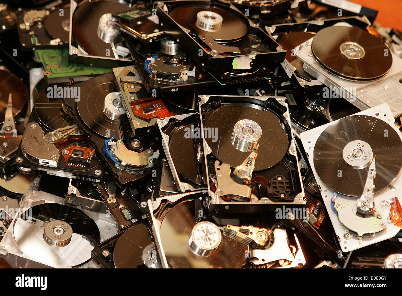 Pile of disused hard discs Stock Photo