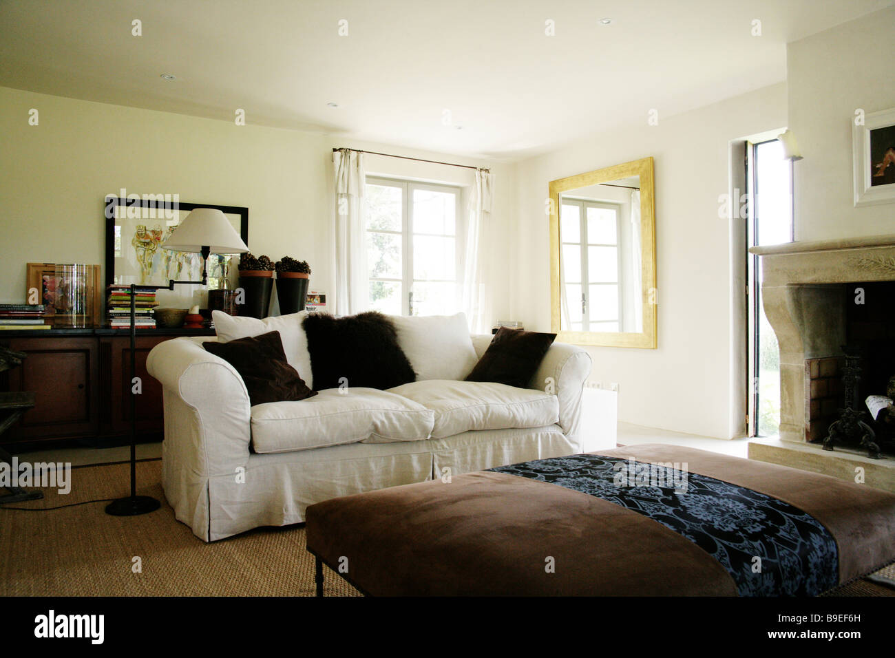 Comfy couch in living room Stock Photo Alamy