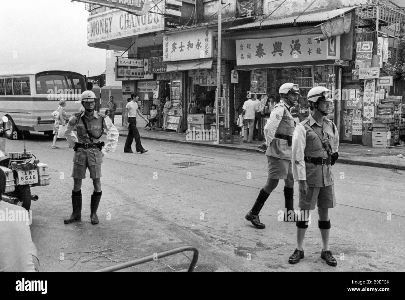 Police in an old Chinese neighborhood of Hong Kong Stock Photo - Alamy
