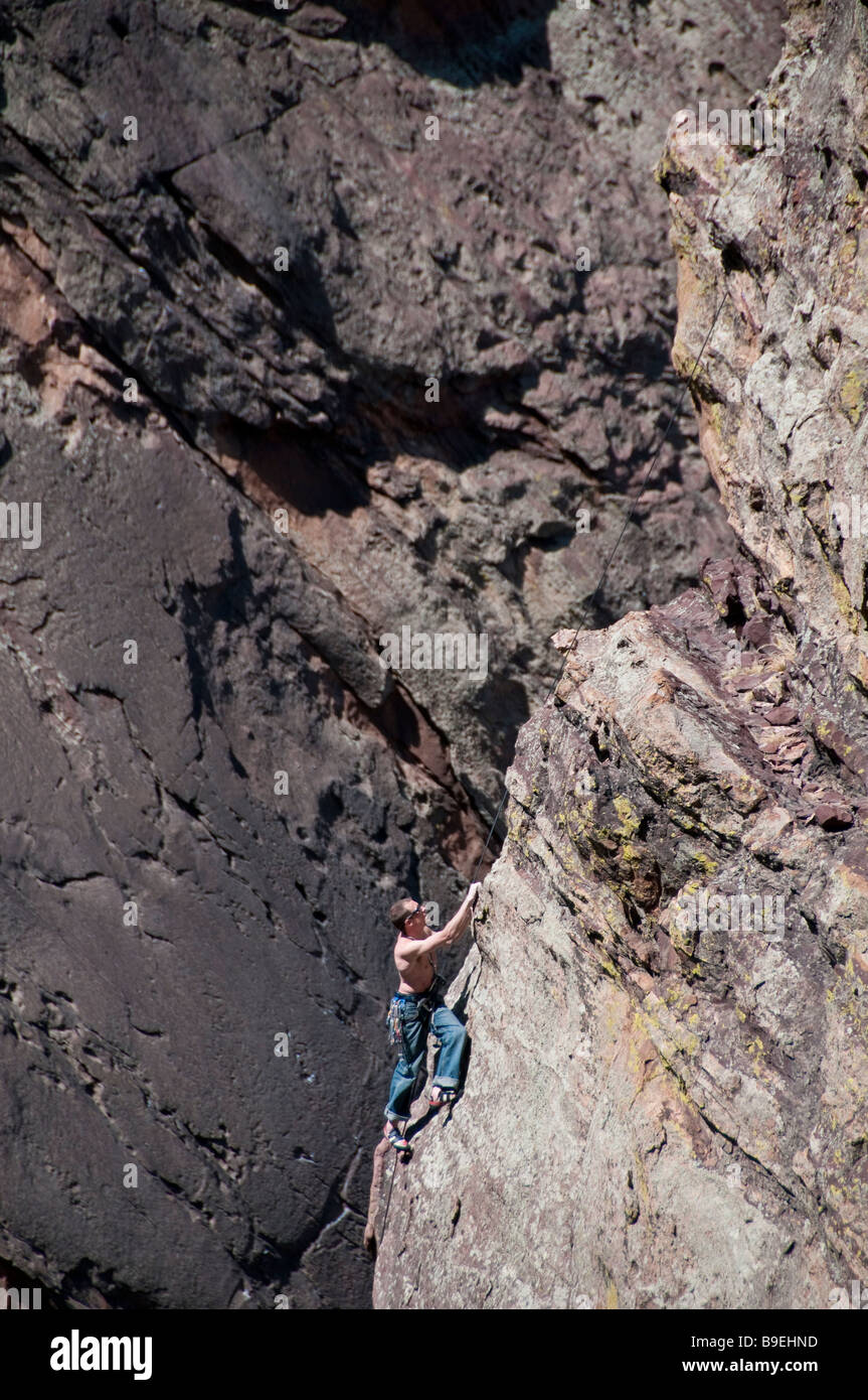 Climber ascends the Bastille, Eldorado Canyon State Park, Eldorado Springs, Colorado. Stock Photo