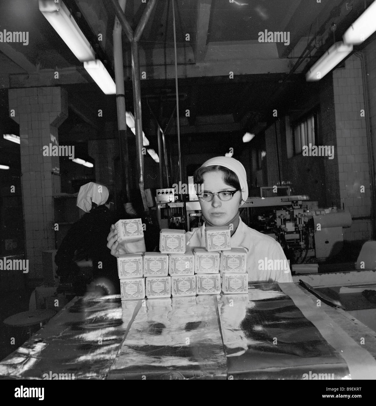 Machine Operators Tea Processing Machine operator at the Lenin Moscow Tea Packing Factory with Ceylon ...