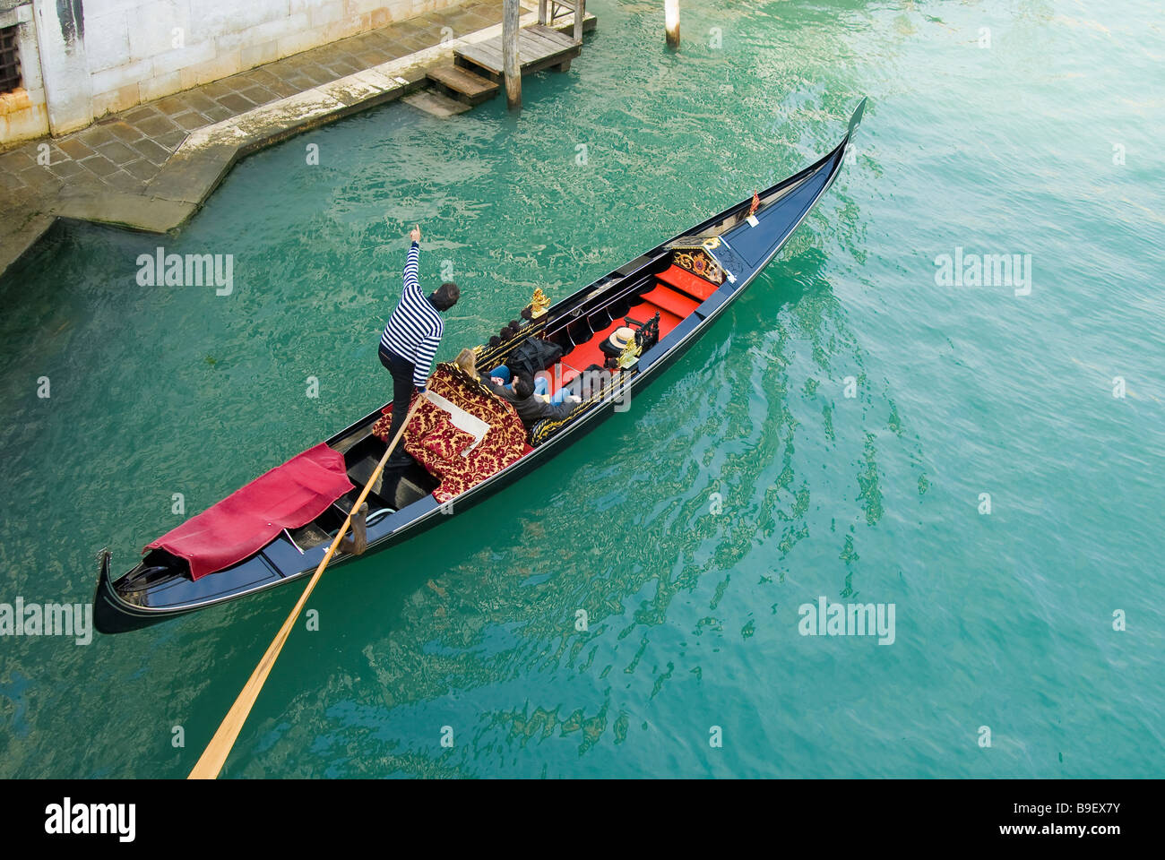 Gondola and gondolier in Venice Italy Stock Photo Alamy