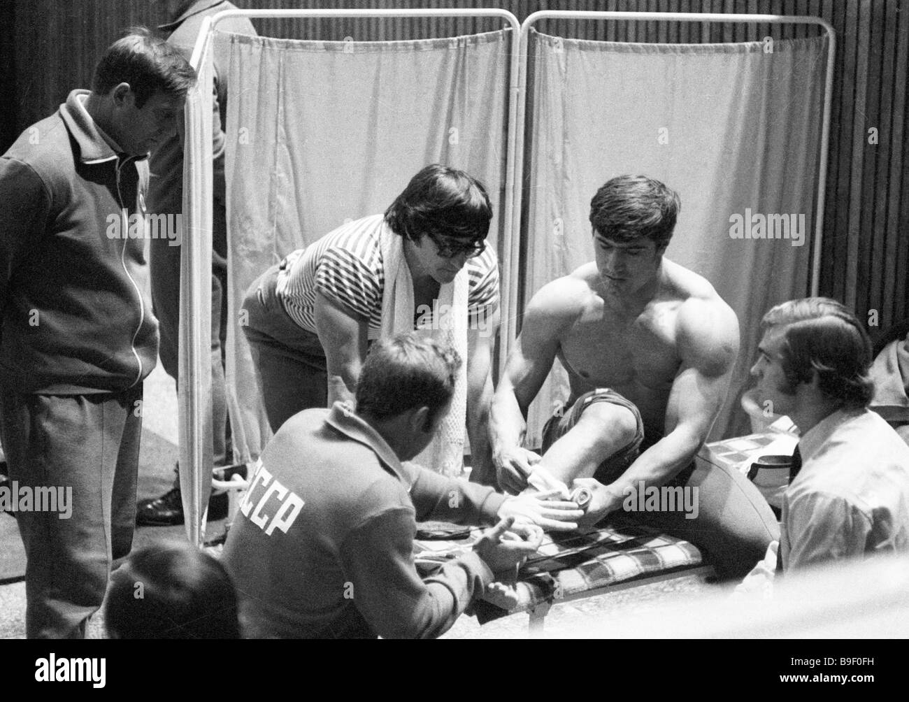 Weight lifter David Rigert second right Olympic champion and five time