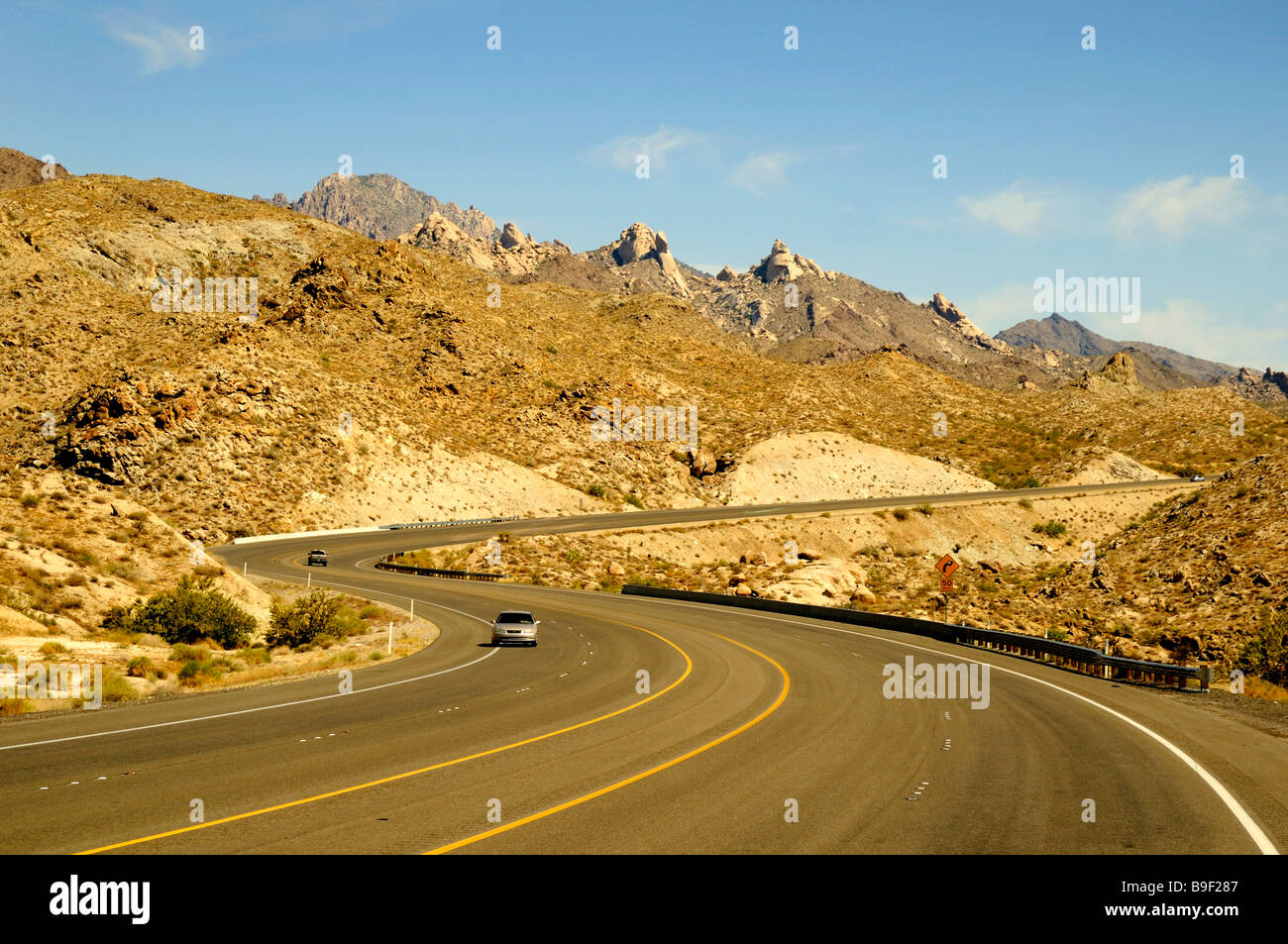 The Nevada Highway through the Mohave Desert in Arizona near Searchlight in the USA Stock Photo