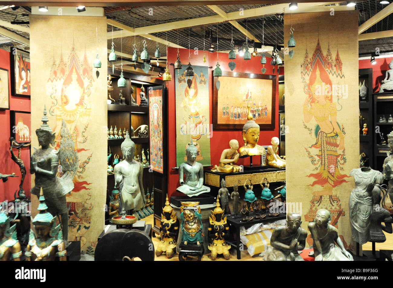A selection of bronze tourist souvenirs in a shopping mall in Patong beach Phuket Thailand Stock Photo