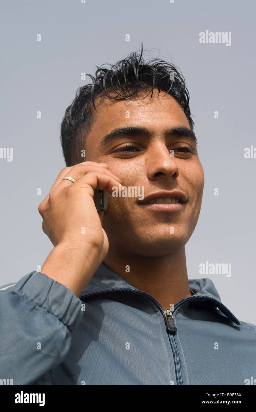 Young man phoning Stock Photo