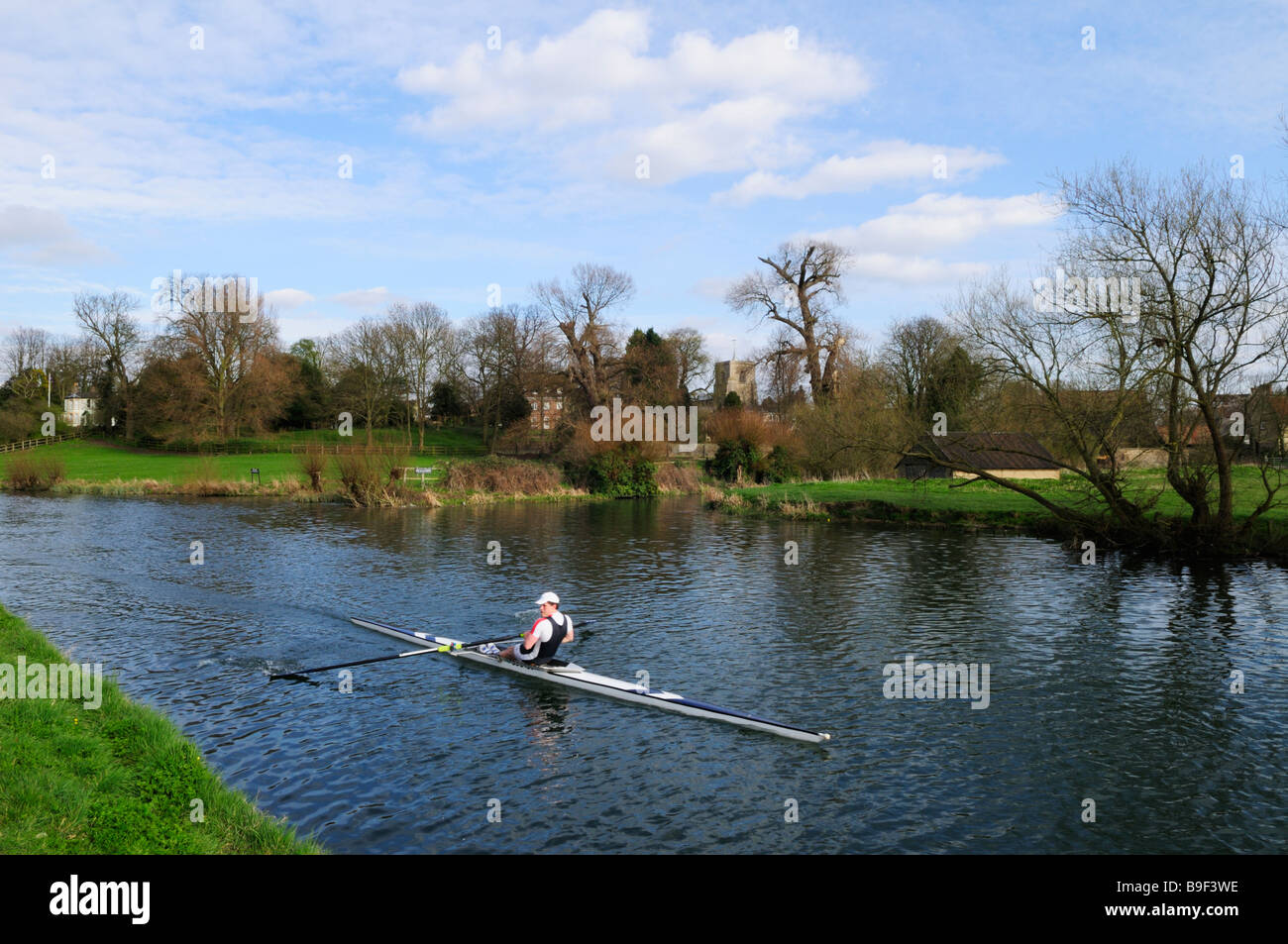 Single Sculler on the River Cam at Fen Ditton Cambridgeshire England UK Stock Photo