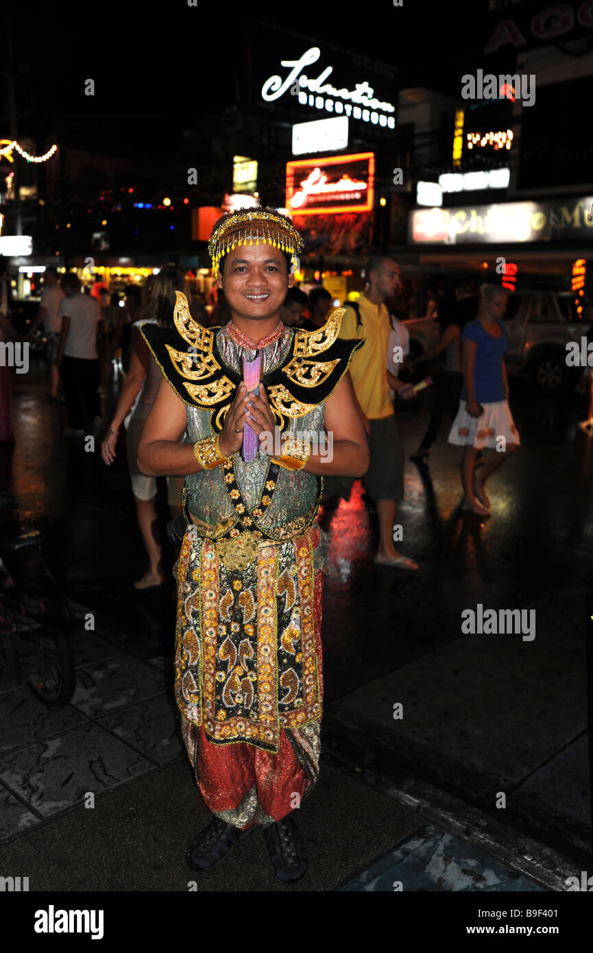 Thai male in traditional costume Night life on the walking street Patong Beach Phuket  Thailand Stock Photo