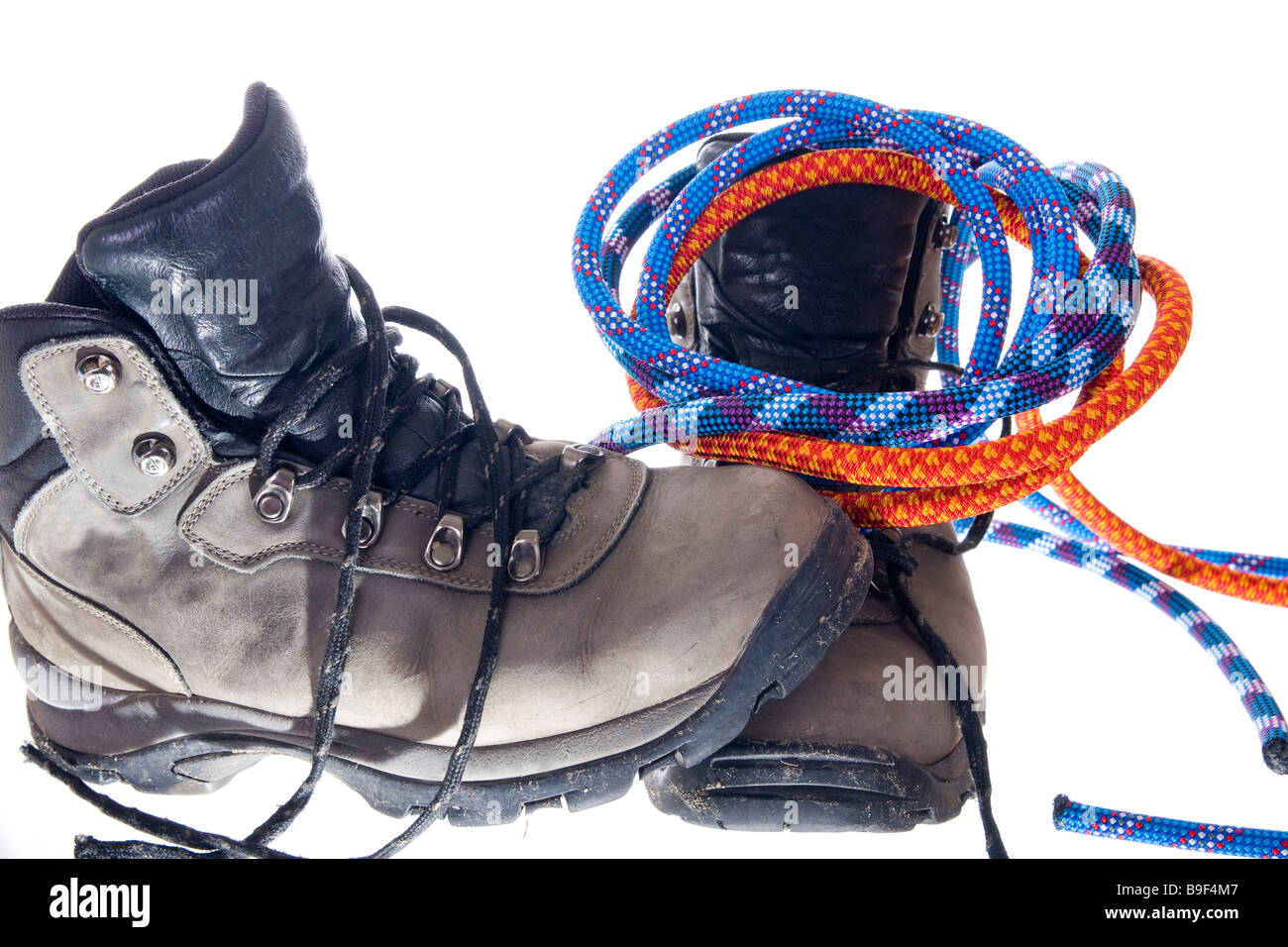 Hiking boots and climbing ropes Stock Photo - Alamy