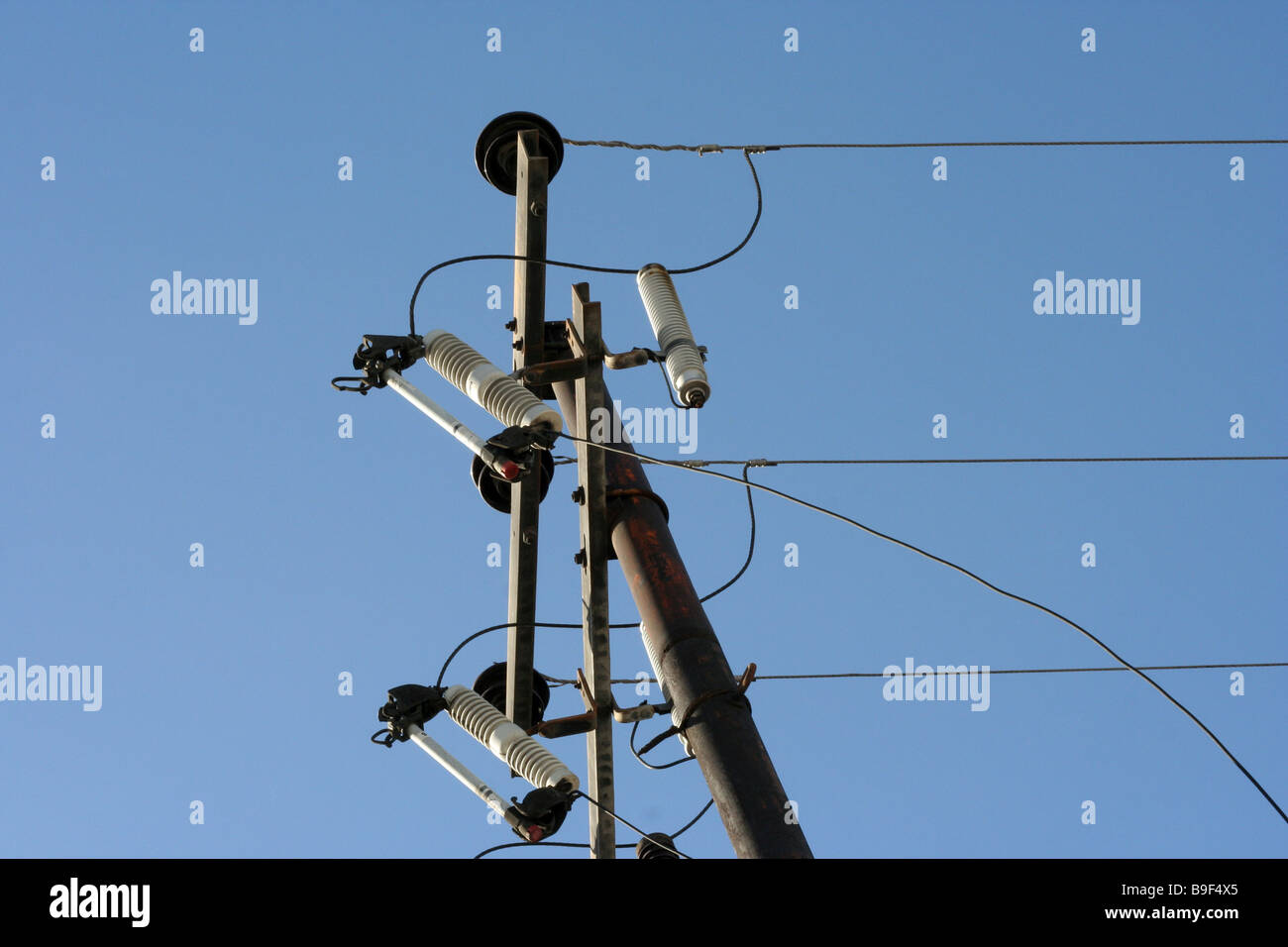 Electricity towers with blue sky Stock Photo - Alamy