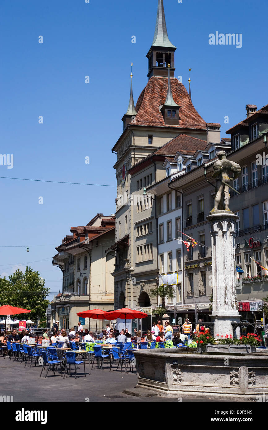 View over Bärenplatz with pavement restaurants to Käfigturm Old Town Berne Canton of Berne Switzerland Stock Photo