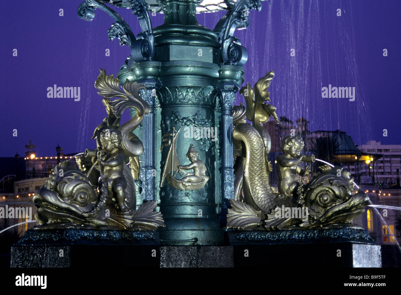 Fountain, lit up at night Stock Photo - Alamy