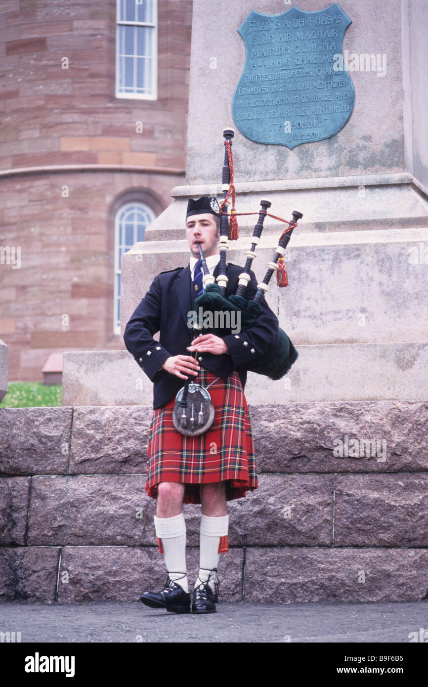 Scottish piper playing bagpipes, Scotland, UK Stock Photo