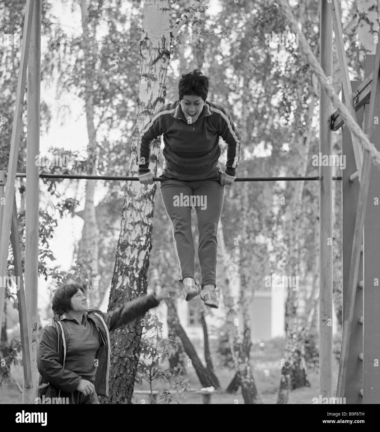 World discus throwing champion Faina Melnik training on the bar Stock