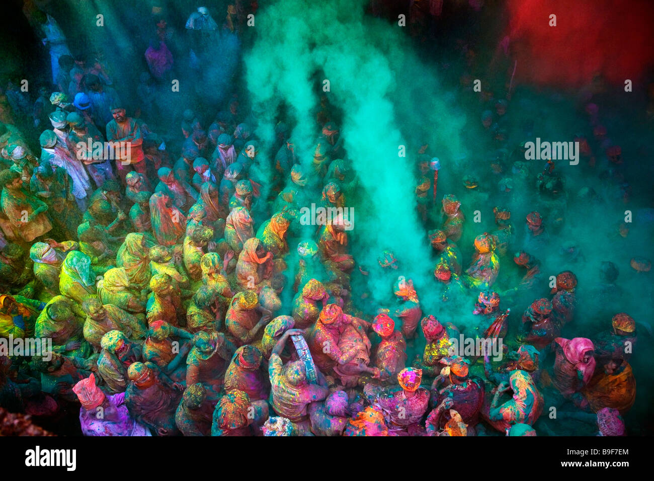 Men from Nandgaon & Barsana sit face to face in a Samaaj (a community gathering) during the festival of Holi Uttar Pradesh India Stock Photo