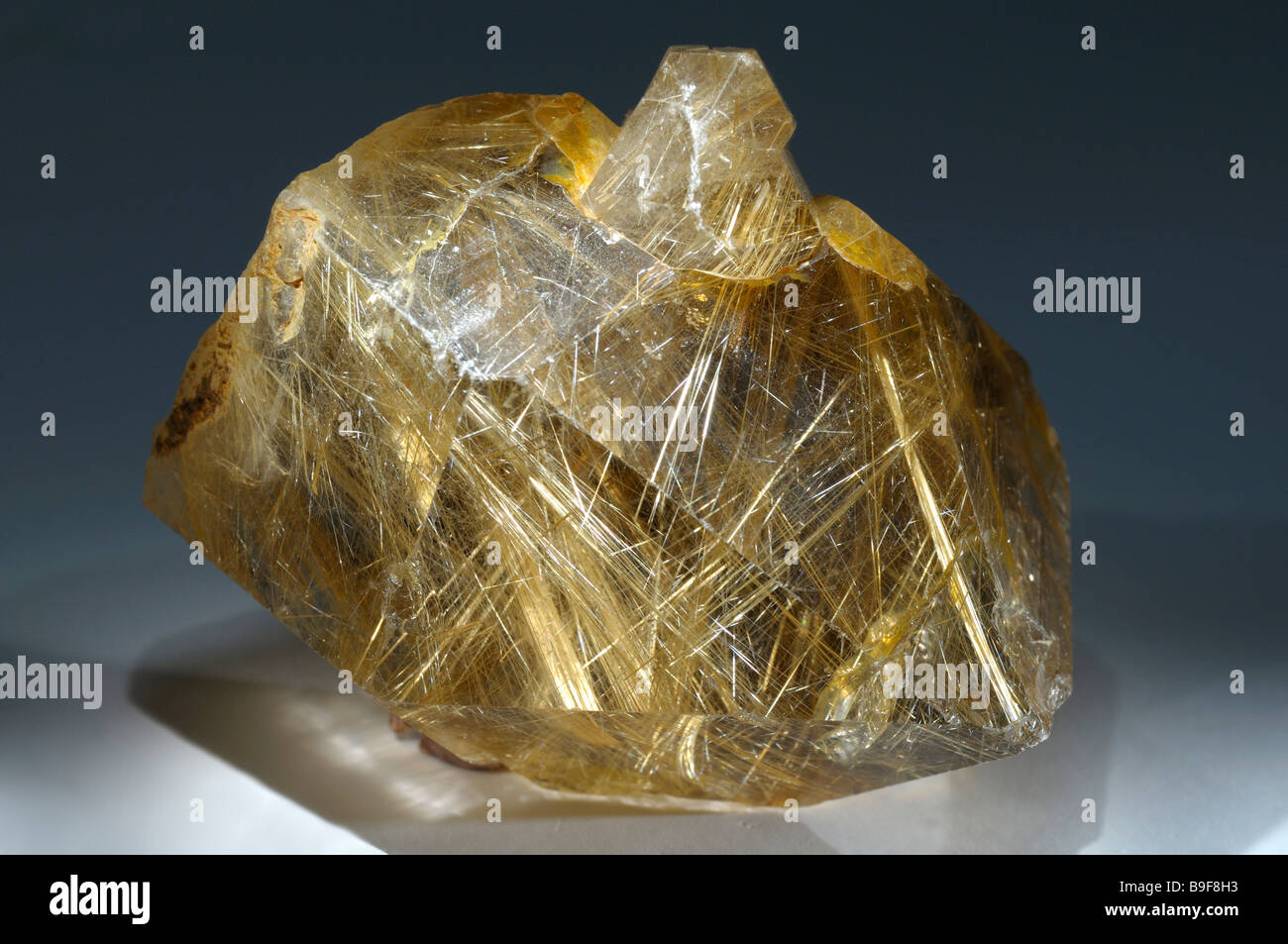 Rutile in quartz, studio picture Stock Photo - Alamy