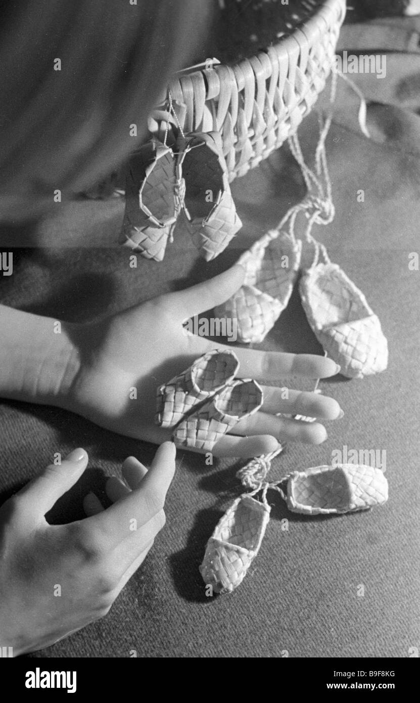 Decorative birch bark shoes samples of Vyatka folk crafts Stock Photo