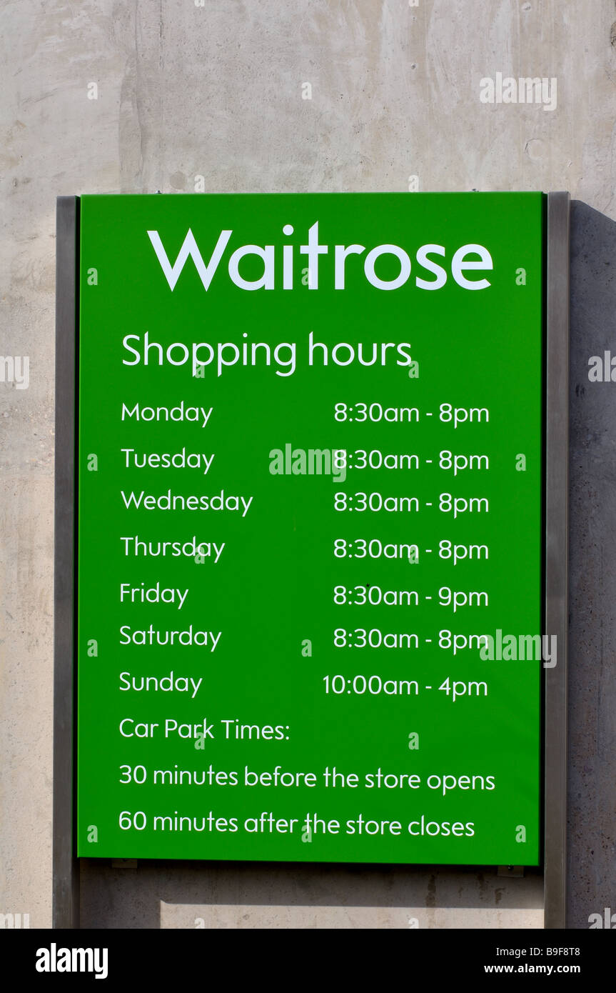Waitrose store opening hours sign, UK Stock Photo - Alamy